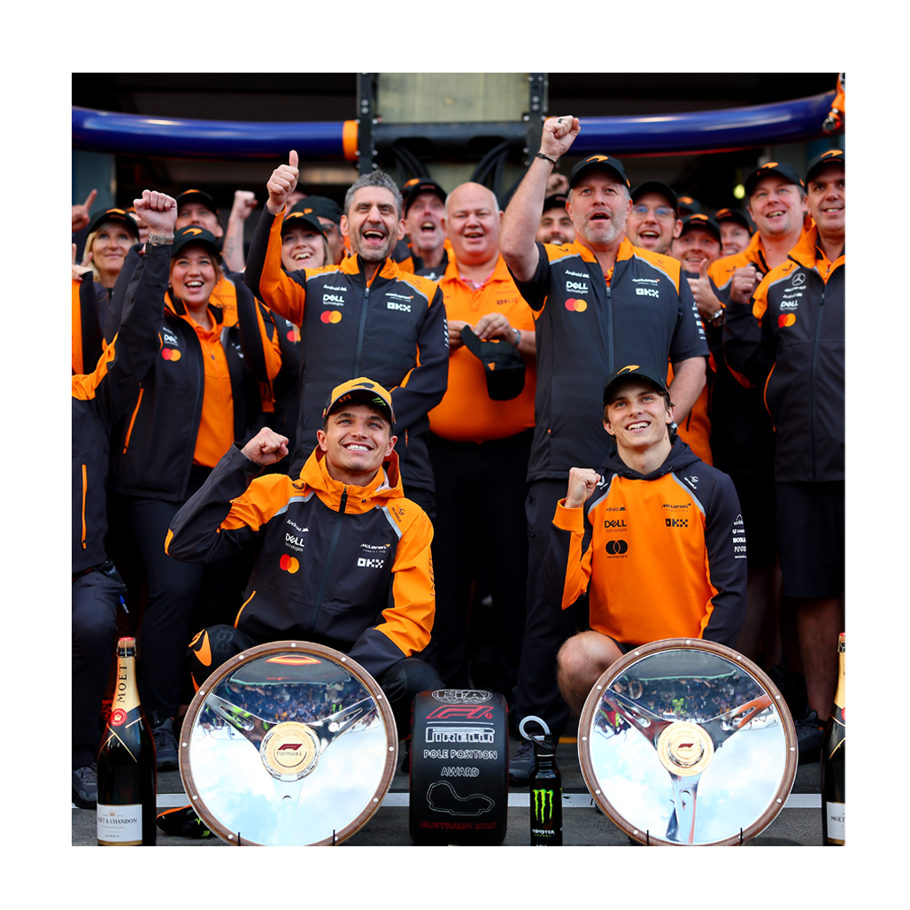 McLaren Race team shot with trophies
