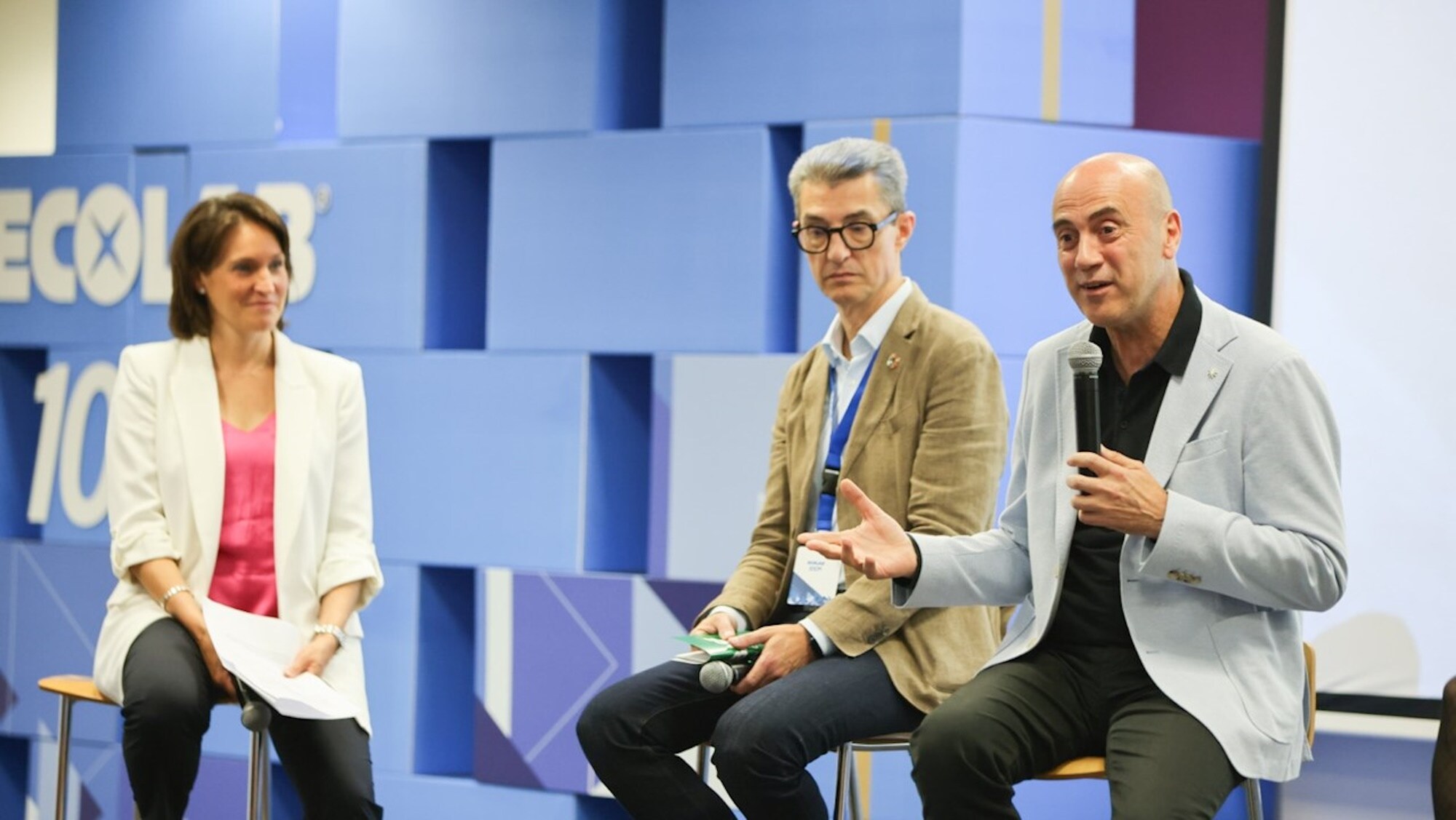 A panel discussion at a customer event 